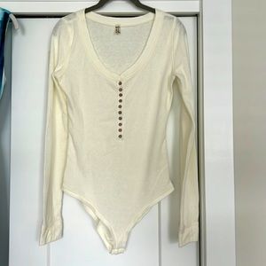 Free people ivory body suit. May have been worn once in great condition.